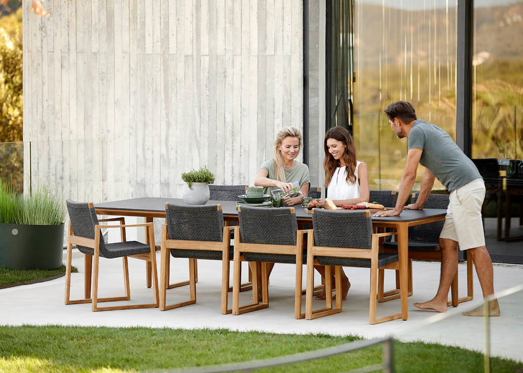 Exclusive outdoor dining table with teak dining chair