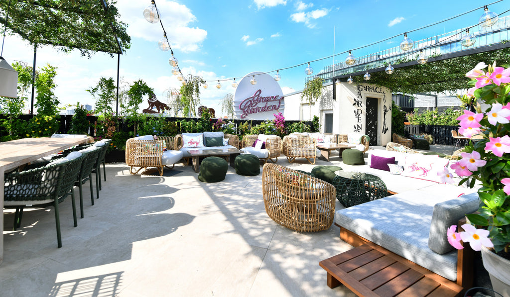 Grace Garden, Berlin rooftop bar and lounge, dark green dining chairs, lounge furniture natural materials