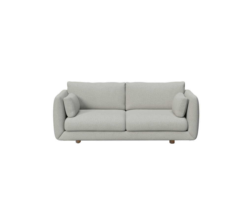 Hellgraues modernes Sofa mit runden Kissen in minimalistischer Gestaltung.