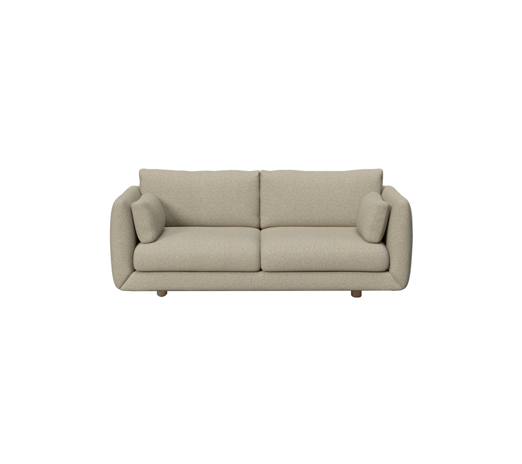 Moderne braune Sofa mit runden Kissen in einer Lounge-Umgebung.