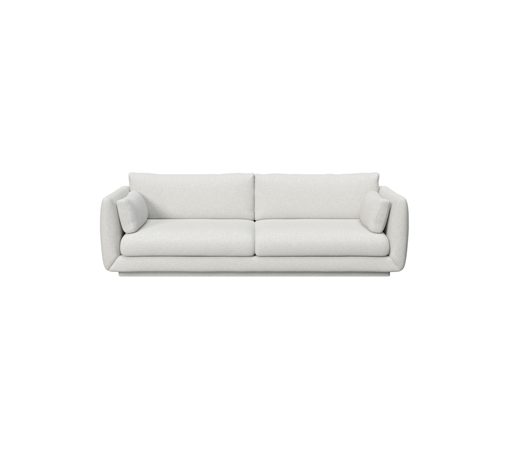 Hellgraues Sofa mit zwei runden Kissen in modernem Design.
