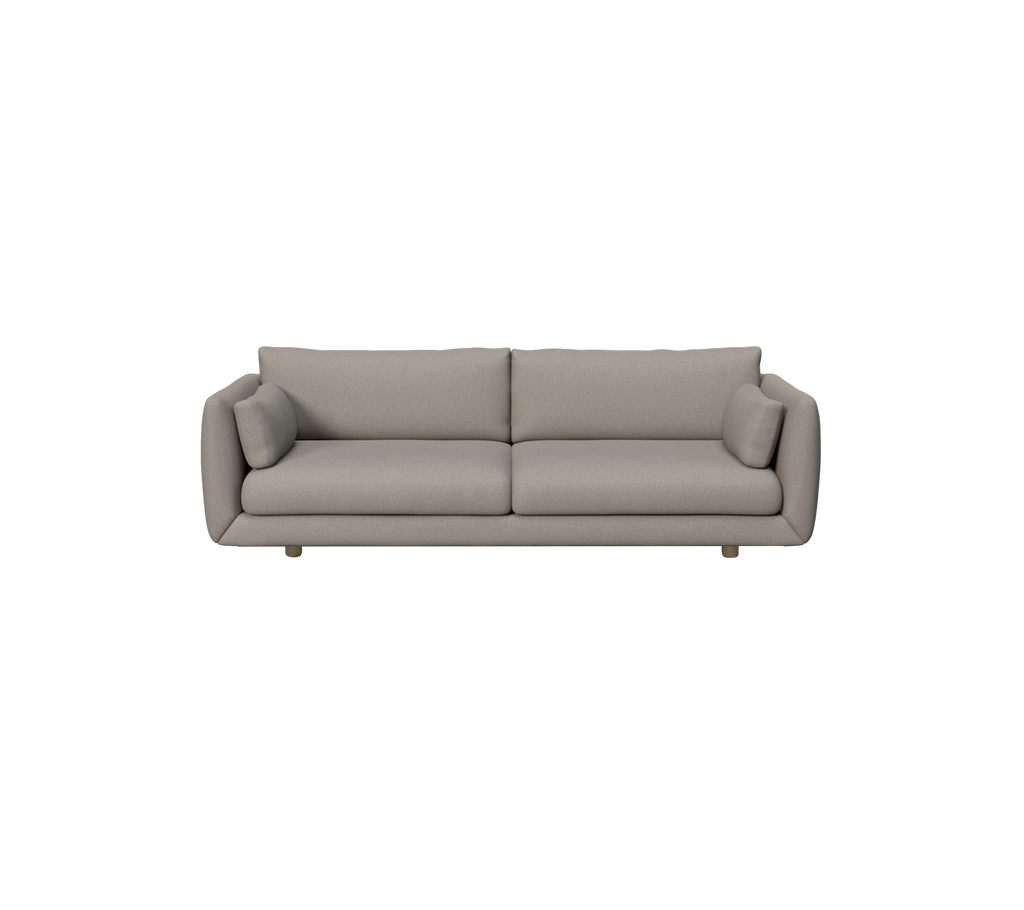 Hellbraunes modernes Sofa mit Seitkissen.