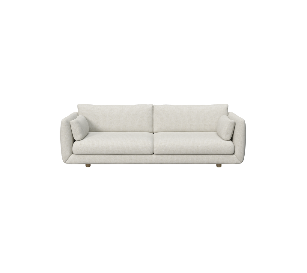 Moderne sandfarbene Sofa mit runden Kissen.