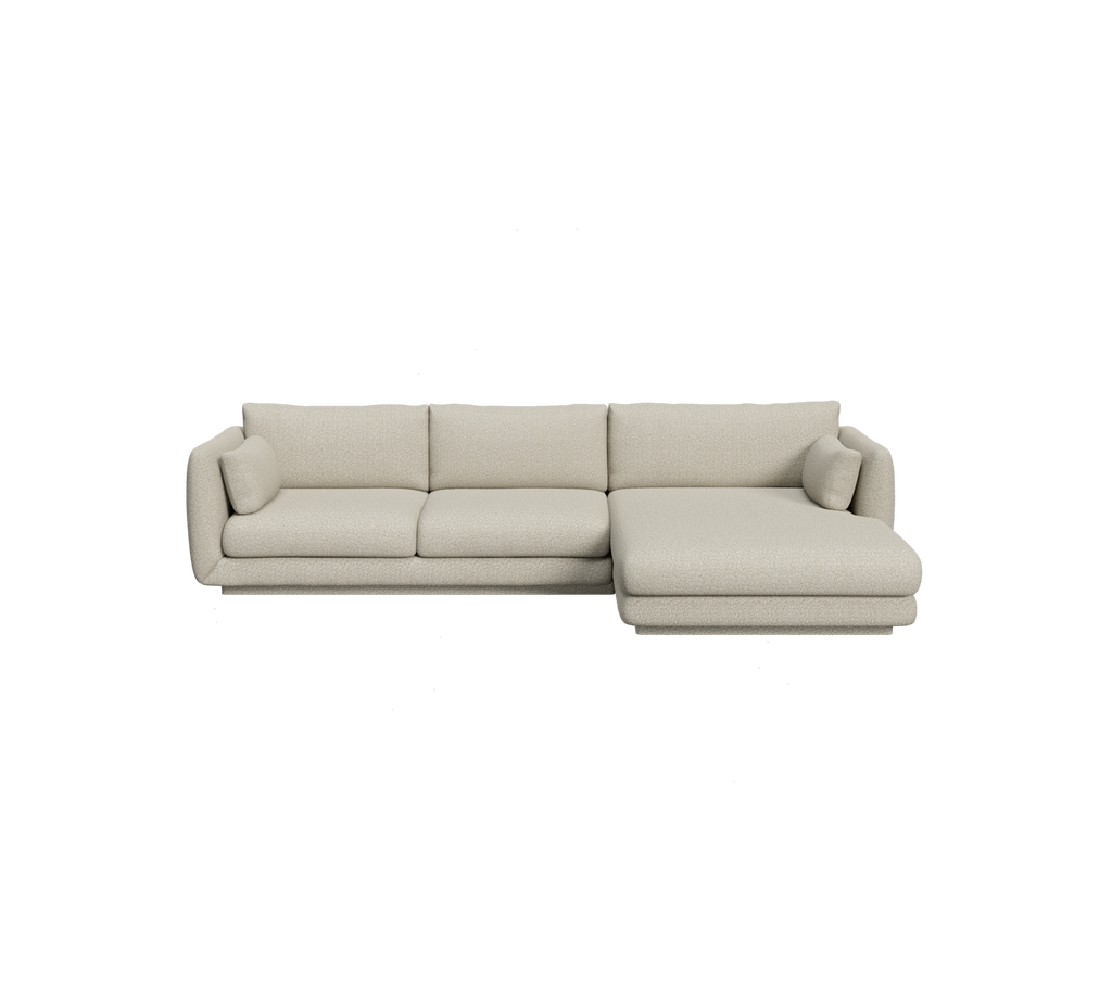 Hellbraune Ecksofa mit minimalistischem Design.