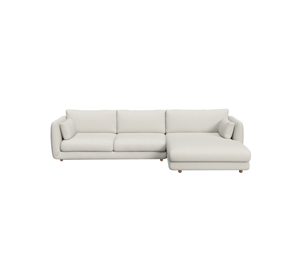 Sandfarbenes Ecksofa mit modernem Design.