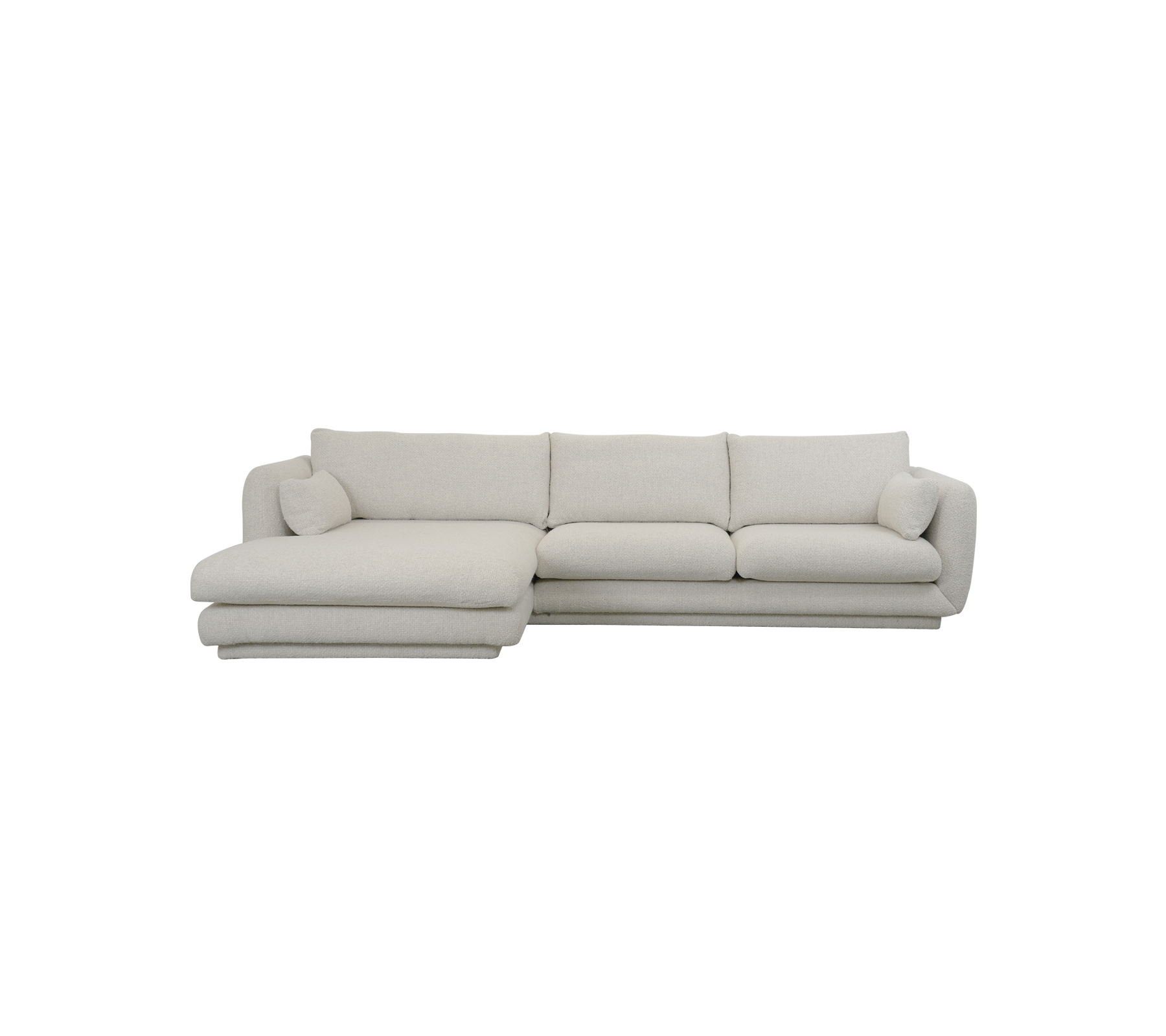 Moderne sandfarbene Ecksofa mit plüschigen Kissen.