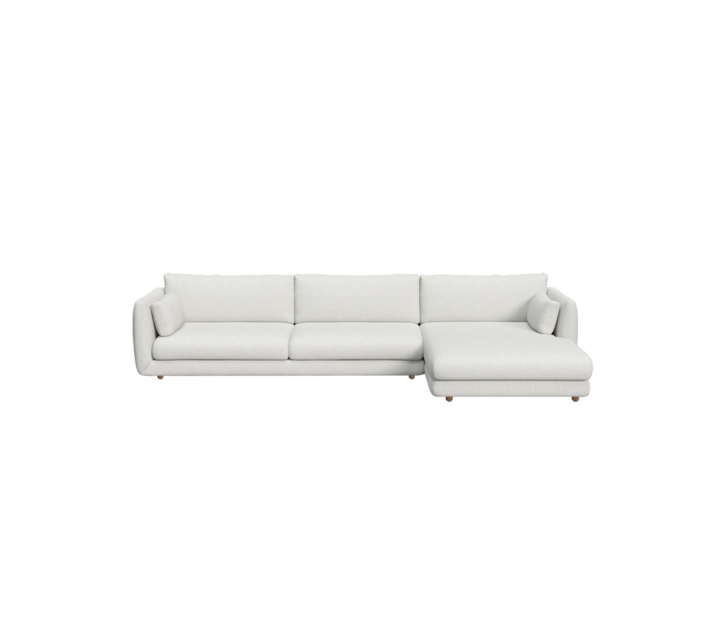 Hellgraues modernes Sofa mit minimalistischer Gestaltung in einem Lounge-Ambiente.