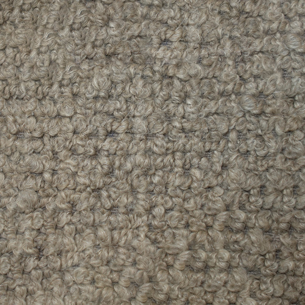 Texturiertes beige Stoff nahaufnahme.